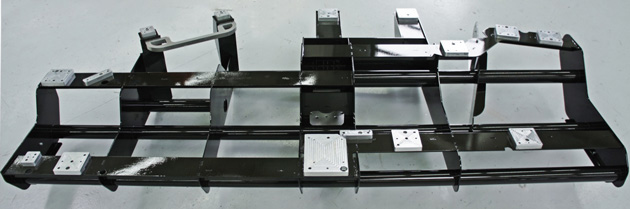 Assembly Systems for the communication industry: Imprinting, checking and packing system for mobile phone displays