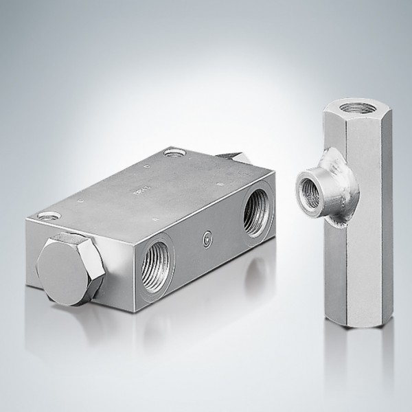 Twin check valve with hydraulic release (left) and check valve (right). Both are available for system pressures up to 700 bar.Photo by HAWE Hydraulik SE  plc