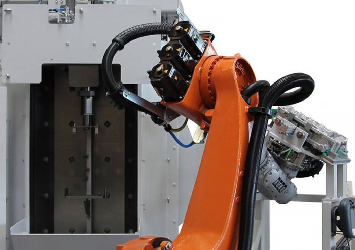 compact turning chamber blast machine
