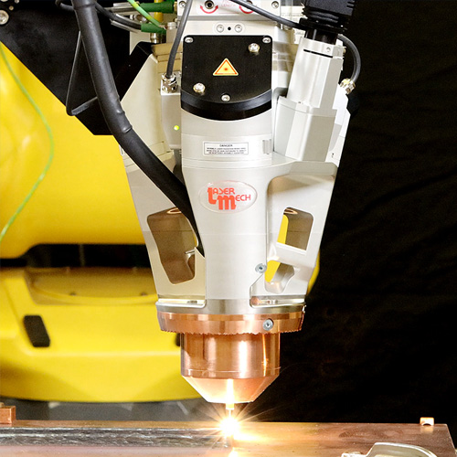 Laser processing head, industrial laser beam delivery by Laser Mechanisms