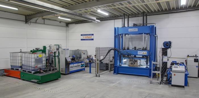 Production line – High-pressure TOPLINE HK metering machine with IBC container station and mould carrier pressPhoto by Hennecke GmbH