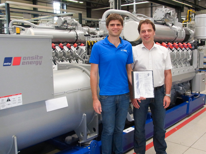 Series 4000 gas generator sets built by MTU Onsite Energy have been certified as compliant with the medium-voltage directive issued by the BDEW (Federal Association of the Energy and Water Industry) in Germany. Pictured: Michael Kreißl (left) and Marcus Mücke (right) at MTU Onsite Energy. Photo by MTU Onsite Energy