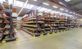 mobile cantilever racking system from OHRA. Nine movable rows of racks, 18.4 meters in length and 6.36 meters in height