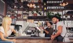 Coffee shop workers standing at the counter