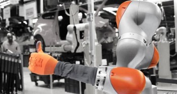 The LBR iiwa at Ford’s factory in Cologne, Germany, gives a thumbs up. Photo by KUKA Roboter GmbH 